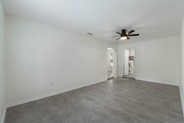 empty room featuring wood-type flooring and ceiling fan