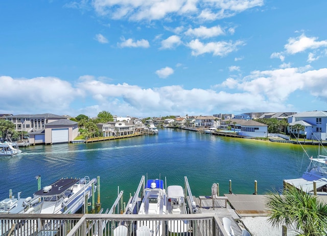 dock area with a water view