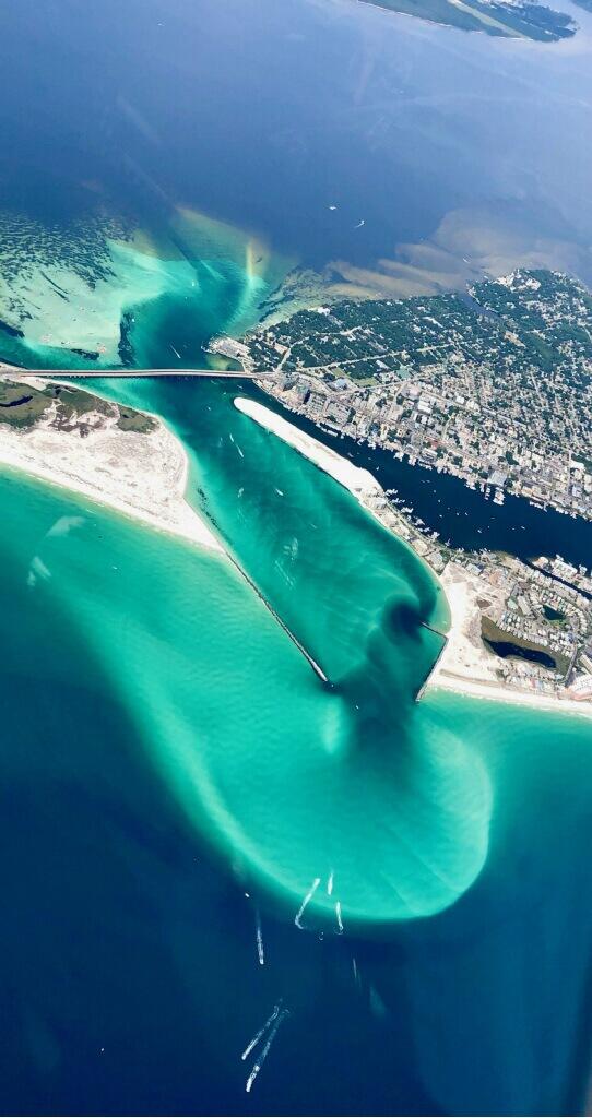 aerial view with a beach view and a water view