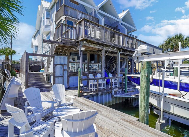 dock area with a water view