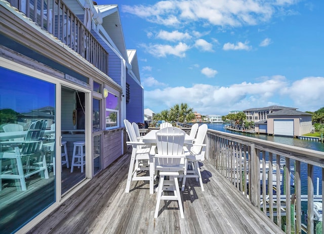 wooden terrace with a water view