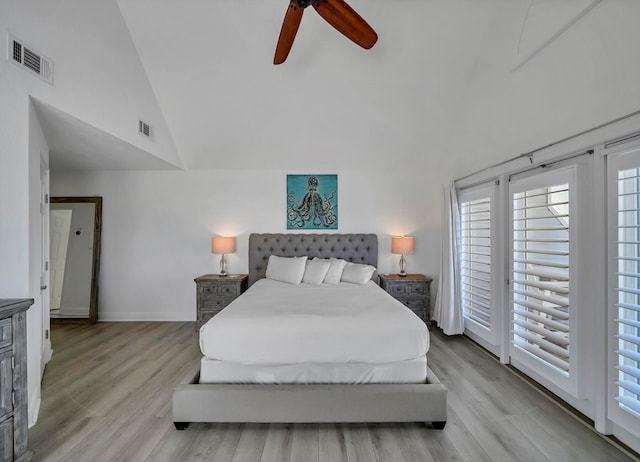 bedroom featuring access to exterior, high vaulted ceiling, light hardwood / wood-style flooring, and ceiling fan