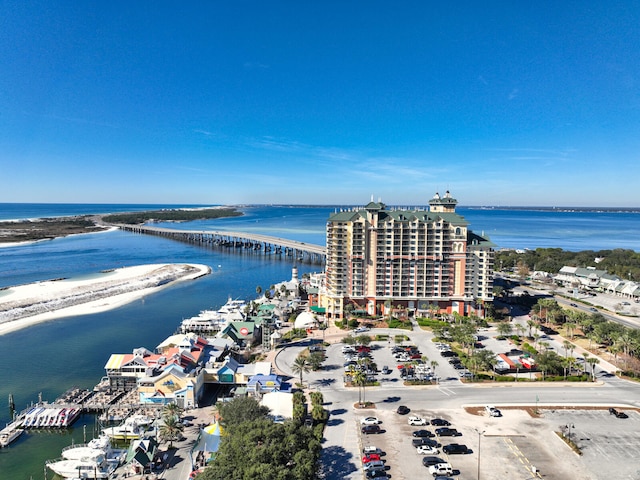 birds eye view of property featuring a view of the beach and a water view