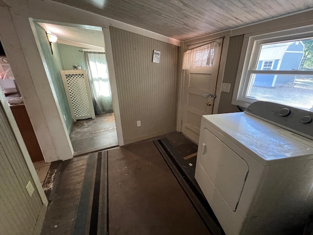 laundry room with dark hardwood / wood-style flooring, washer / clothes dryer, wooden ceiling, and wood walls