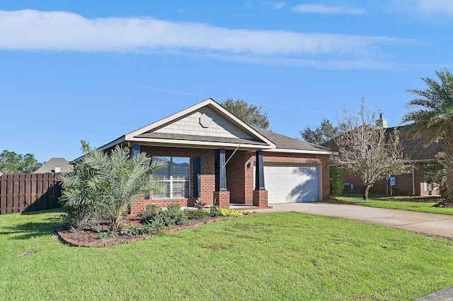 view of front of house featuring a garage and a front lawn