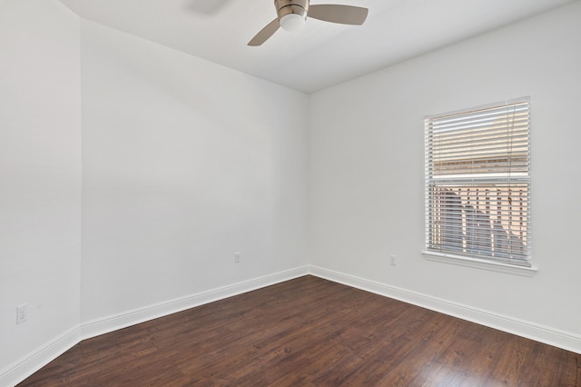 spare room featuring hardwood / wood-style flooring and ceiling fan