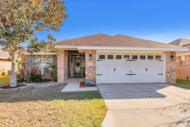 9761 Leeward Way, Navarre, FL 32566 - ranch-style house with brick siding, a garage, driveway, and roof with shingles