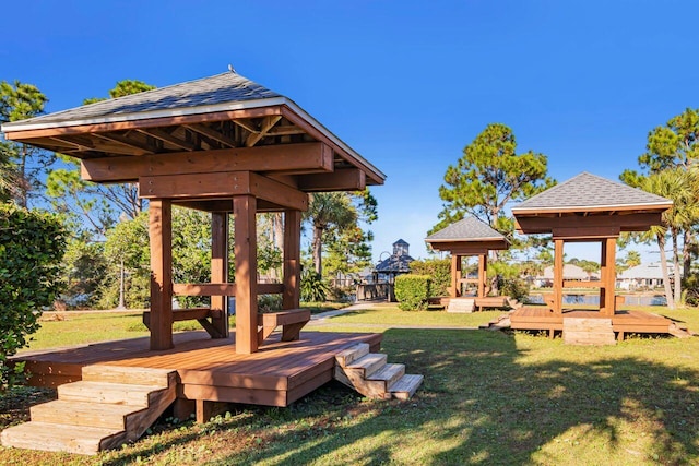 9761 Leeward Way, Navarre, FL 32566 - view of green lawn featuring a gazebo and a deck