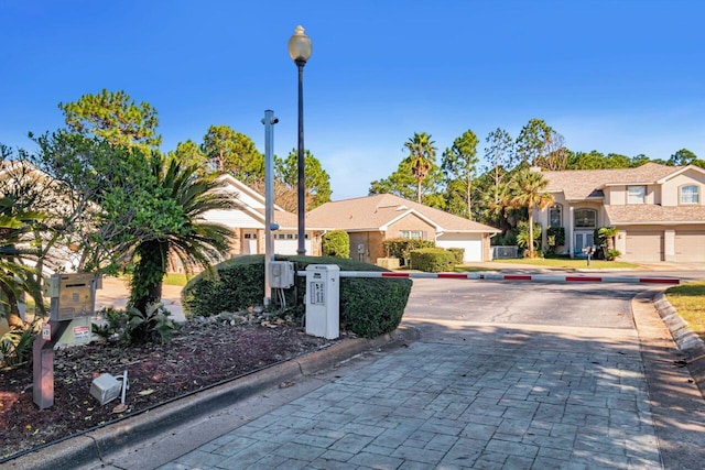 9761 Leeward Way, Navarre, FL 32566 - view of front facade with a residential view