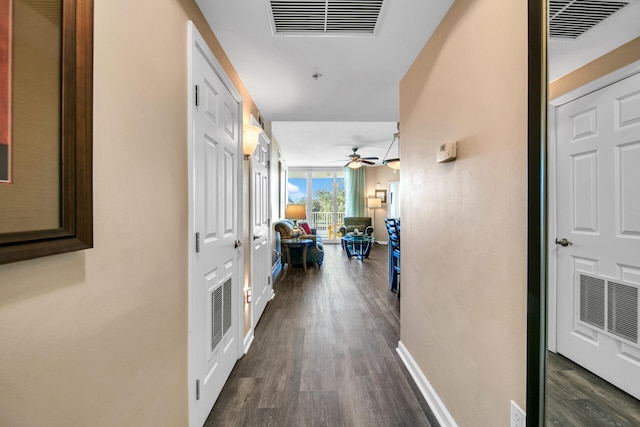 4207 Indian Bayou Trl Unit 2216, Destin, FL 32541 - hallway with dark wood-style floors and baseboards