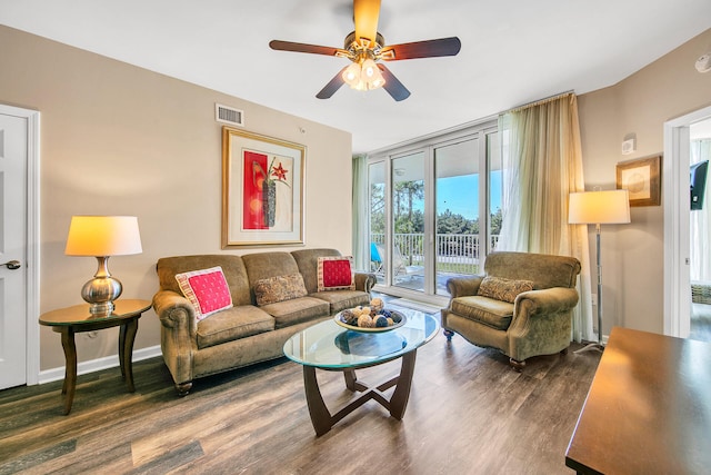4207 Indian Bayou Trl Unit 2216, Destin, FL 32541 - living area featuring a ceiling fan, wood finished floors, floor to ceiling windows, and baseboards