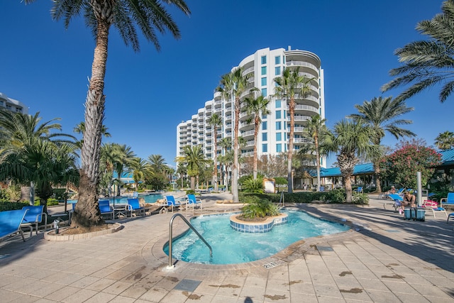 4207 Indian Bayou Trl Unit 2216, Destin, FL 32541 - community pool featuring a patio area