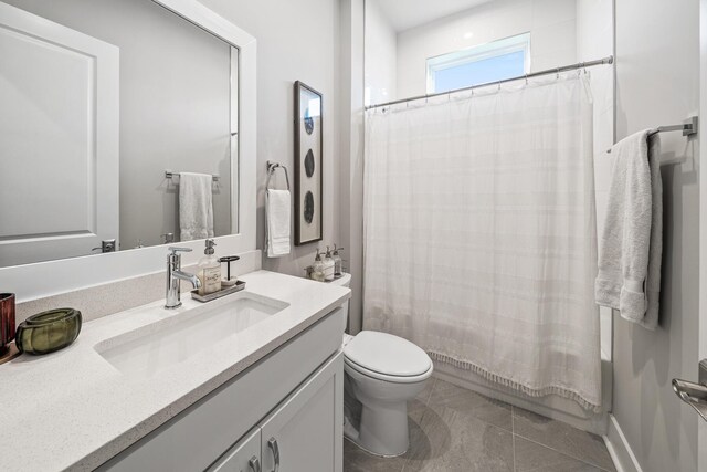 131 W Lafayette Rd, Inlet Beach, FL 32461 - full bathroom with vanity, toilet, tile patterned flooring, and shower / tub combo