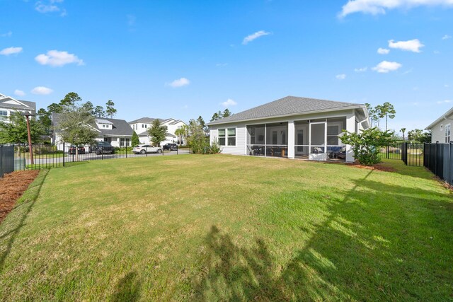 131 W Lafayette Rd, Inlet Beach, FL 32461 - view of yard featuring a sunroom and a residential view