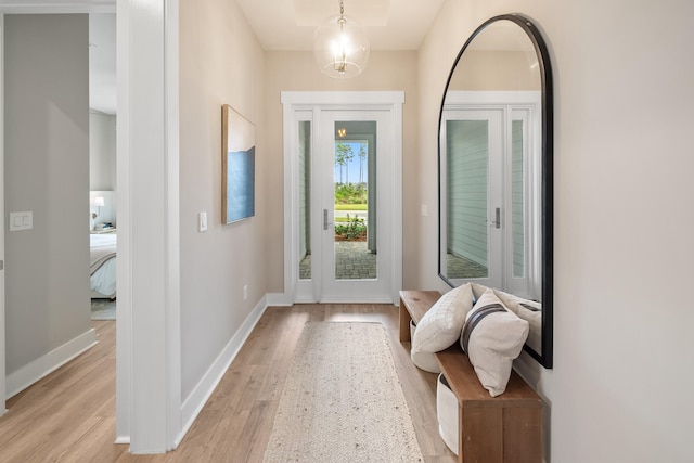 entryway with light hardwood / wood-style floors