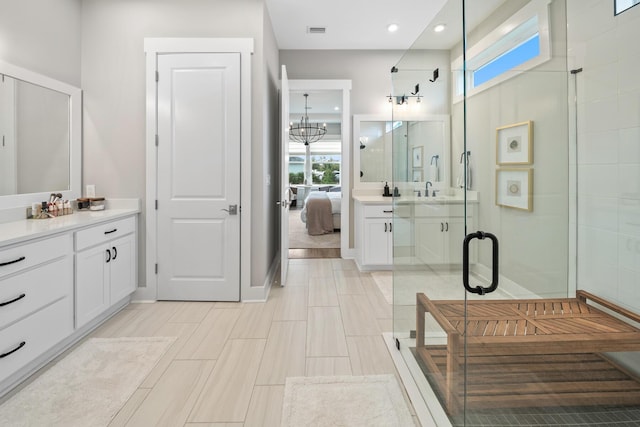 131 W Lafayette Rd, Inlet Beach, FL 32461 - bathroom with vanity, a chandelier, a stall shower, and recessed lighting