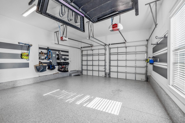 garage featuring a garage door opener