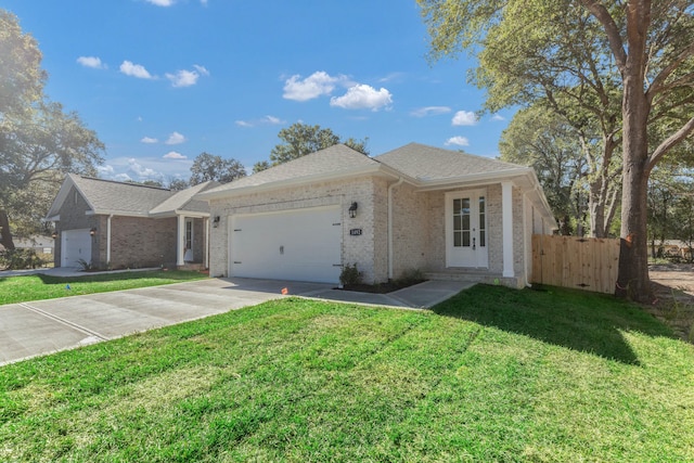 single story home featuring a garage, brick siding, concrete driveway, fence, and a front yard