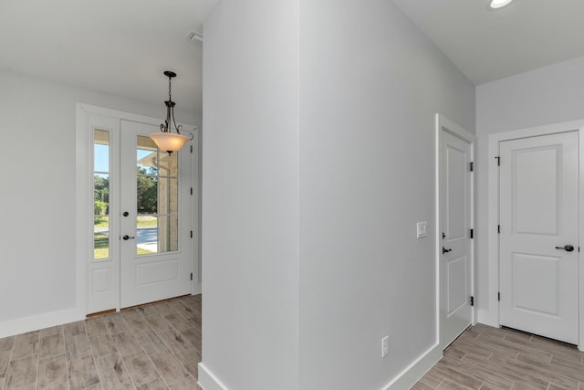 entrance foyer featuring light hardwood / wood-style floors