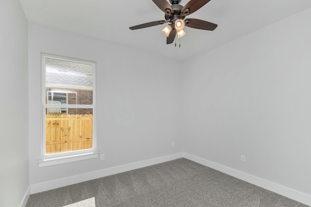 unfurnished room with carpet and ceiling fan