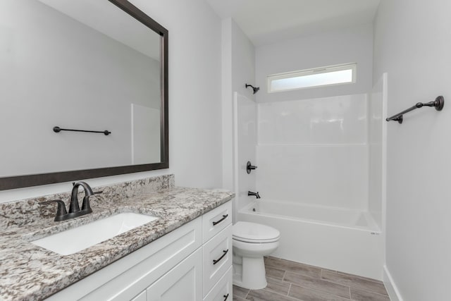 full bathroom with vanity, toilet, and shower / bath combination