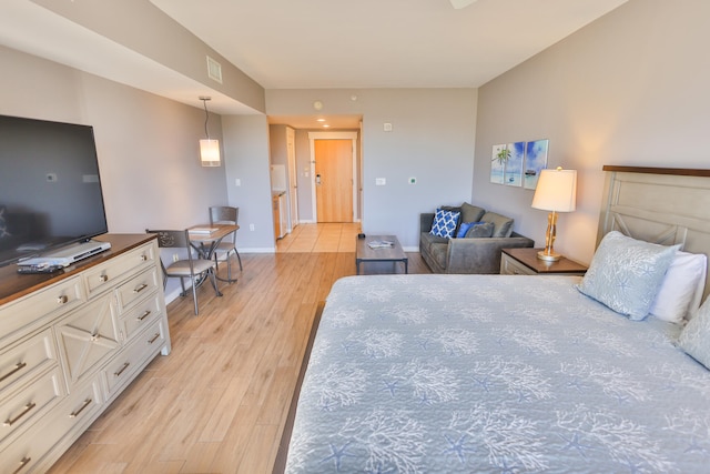 bedroom featuring light wood-type flooring