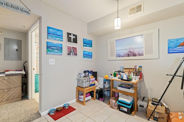 game room with electric panel, light tile patterned floors, and a textured ceiling