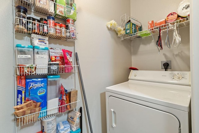 washroom with washer / clothes dryer