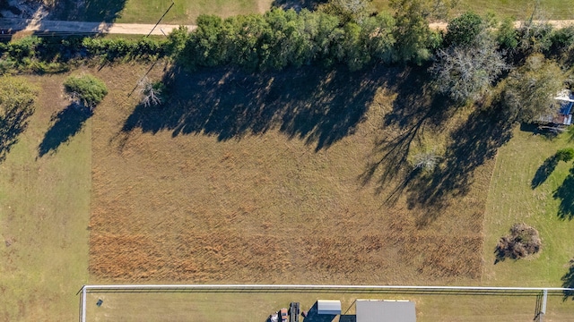 birds eye view of property featuring a rural view