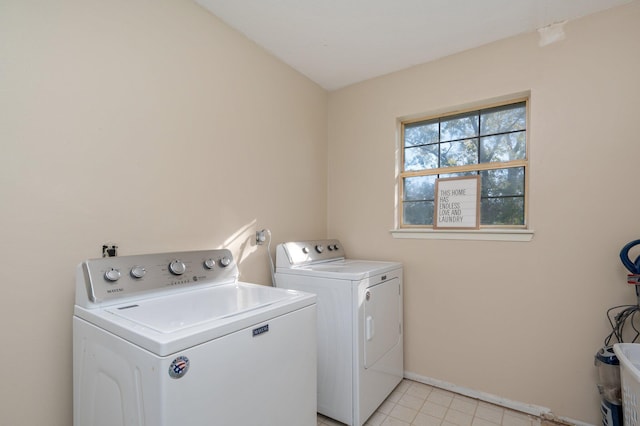 laundry room with washer and clothes dryer