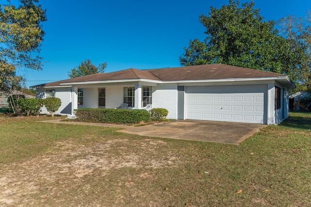 single story home with a garage and a front yard