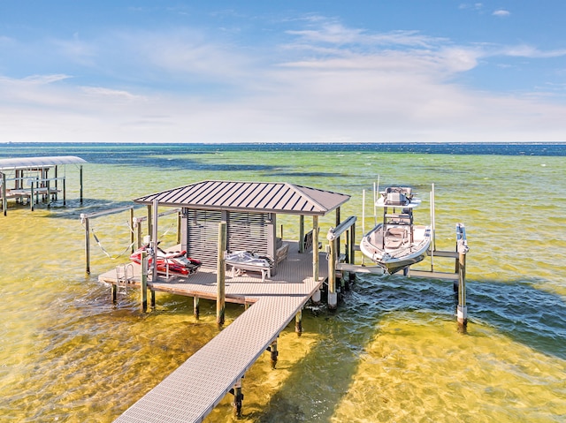 view of dock with a water view