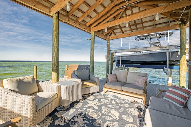 view of patio / terrace featuring outdoor lounge area, a gazebo, and a water view