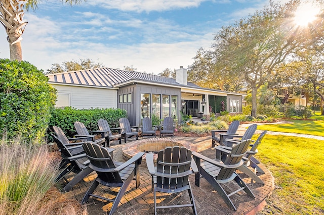 view of patio / terrace with a fire pit