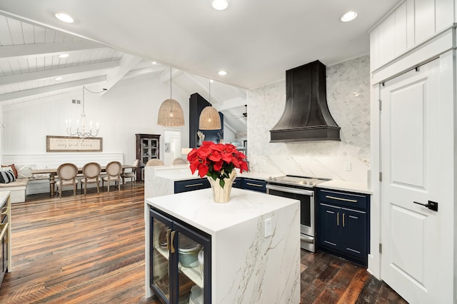 kitchen with a center island, premium range hood, stainless steel range with electric cooktop, hanging light fixtures, and dark hardwood / wood-style floors