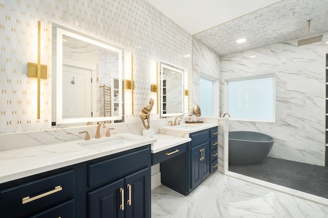 bathroom featuring a shower and vanity