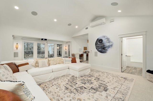 carpeted living room with vaulted ceiling and a wall mounted AC