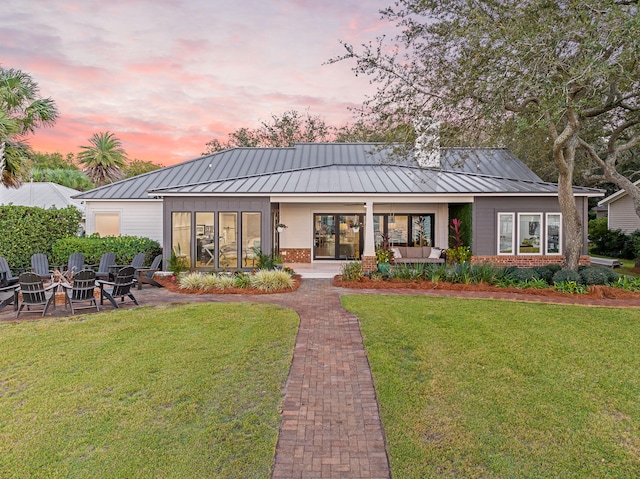 exterior space featuring a lawn