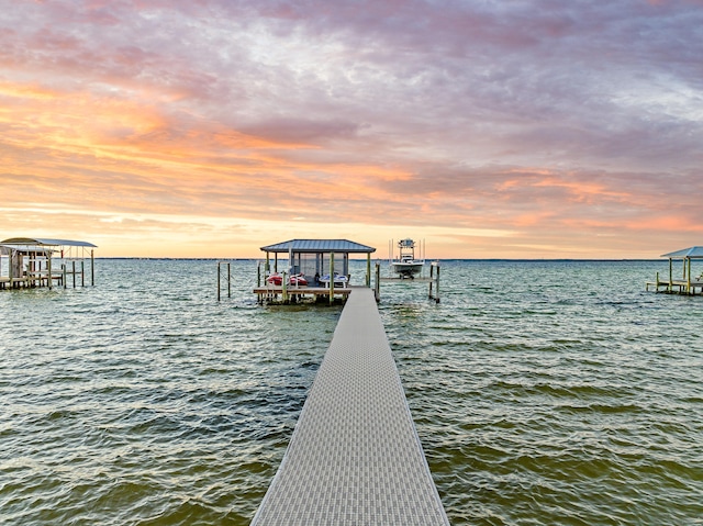 view of dock with a water view