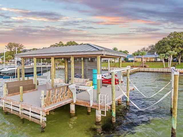 dock area with a water view