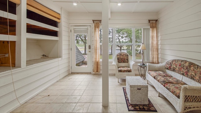 sunroom / solarium featuring plenty of natural light