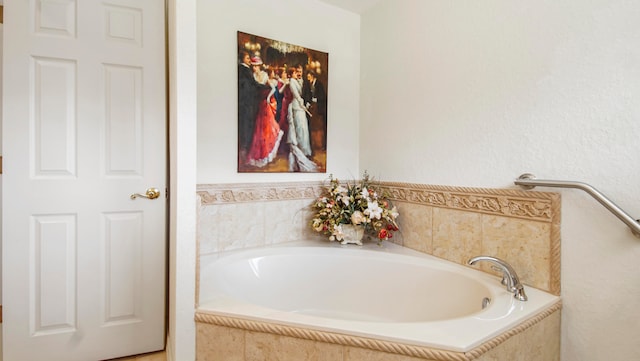 bathroom with tiled tub