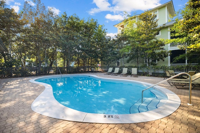 view of pool with a patio