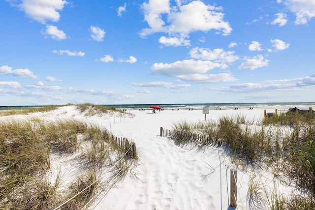 property view of water with a beach view