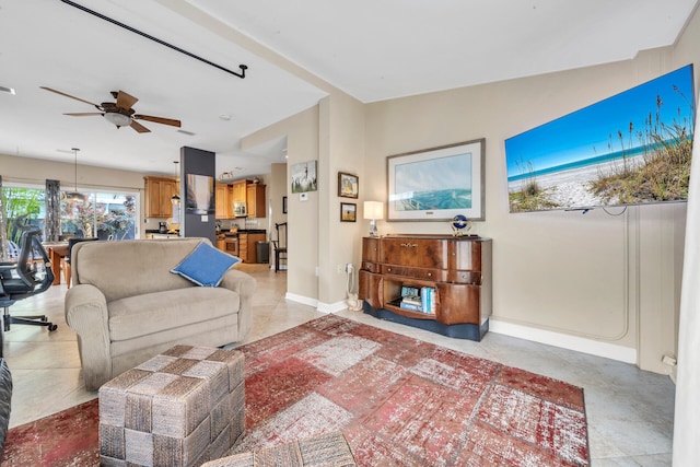 living room featuring ceiling fan