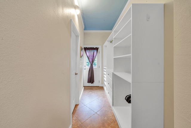 hallway with light tile patterned floors