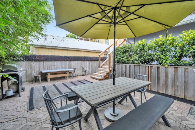 view of patio / terrace with a grill