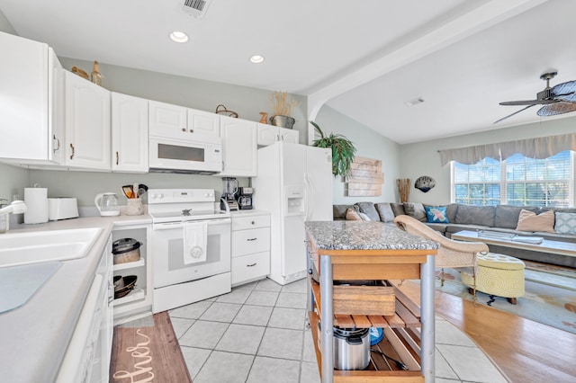 kitchen with light wood-type flooring, white appliances, ceiling fan, lofted ceiling with beams, and white cabinets