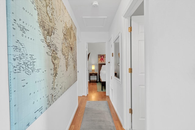 hall with light wood-type flooring