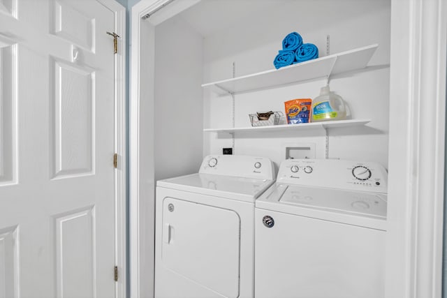 washroom featuring separate washer and dryer